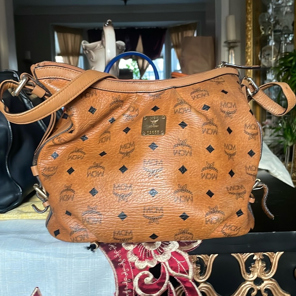 MCM hobo bag in signature cognac color.